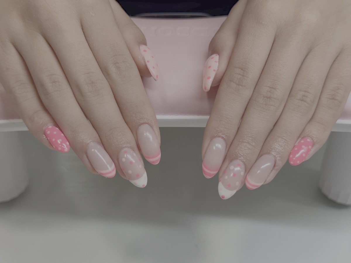 Soft pink French tips with polka dot accents by Polished by Bug in Cedar City, Utah