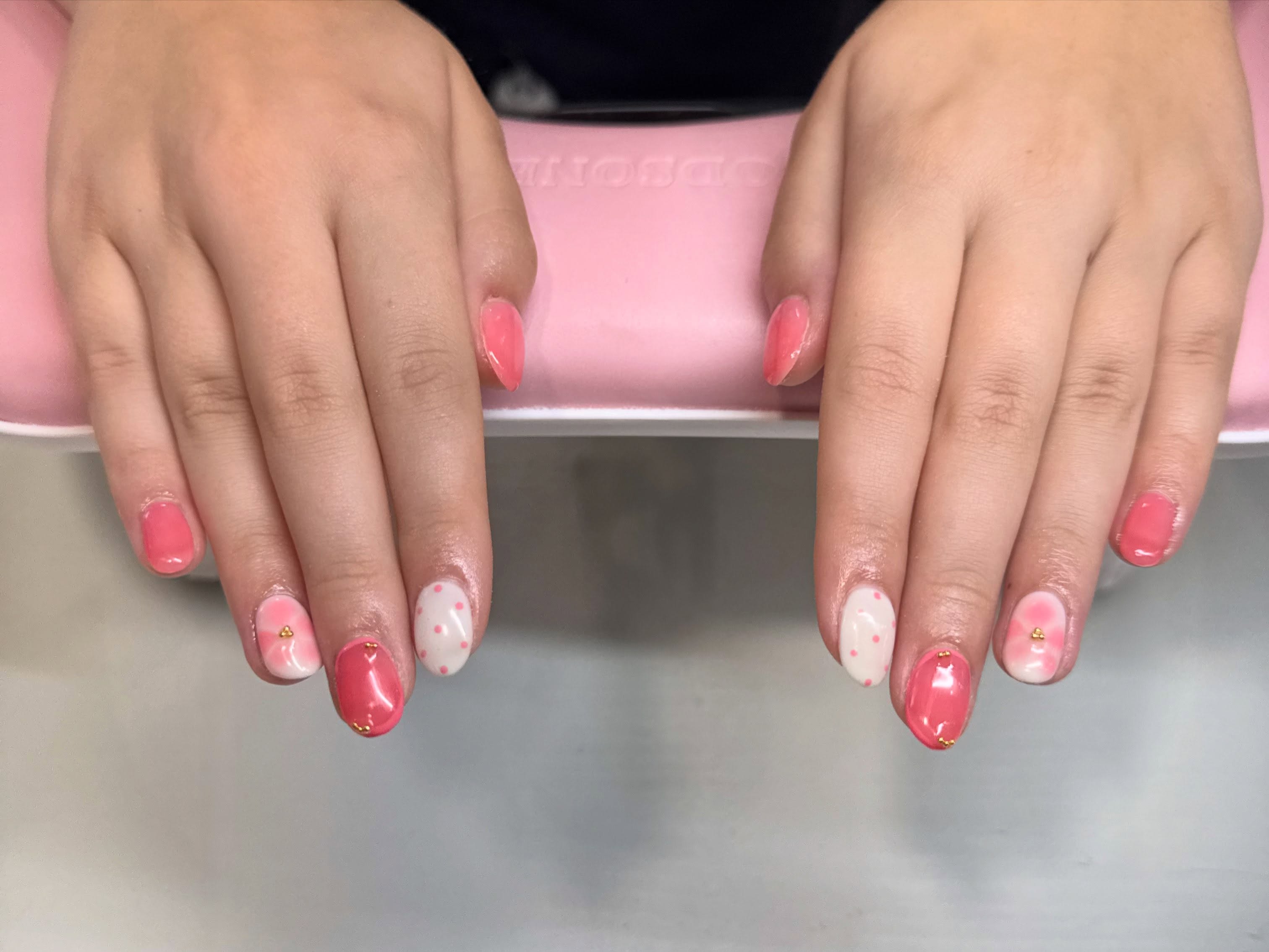 Pink gel set with polka dot accent nails by Polished by Bug in Cedar City, Utah